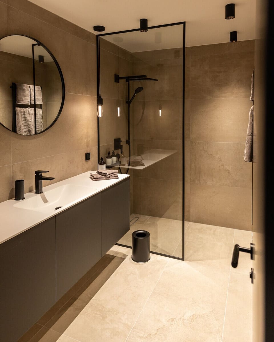 Bathroom with walk-in shower and vanity