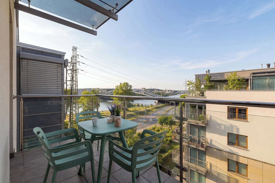 The balcony provides a perfect spot for enjoying the fresh air.