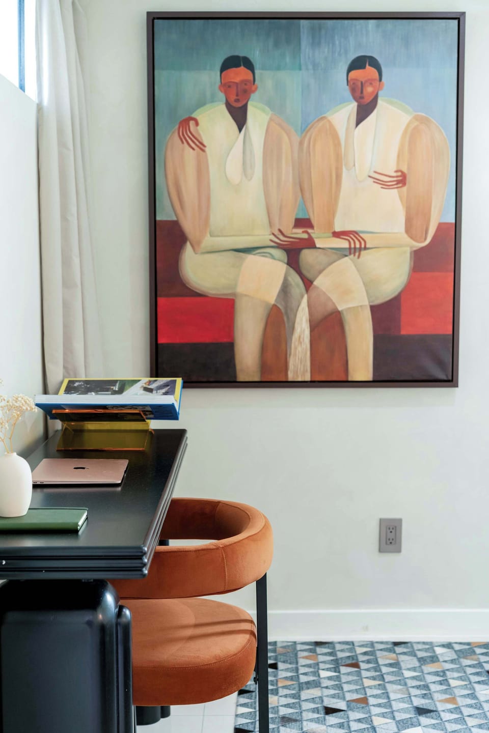 Dedicated wooden desk and designer chair, perfect for remote work