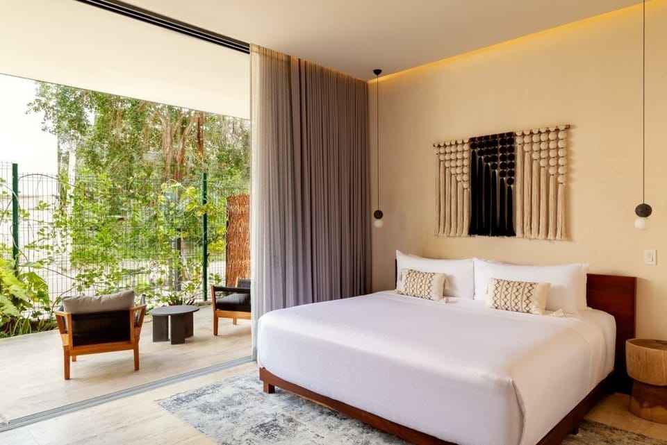 Wake to garden views and step straight onto the terrace.