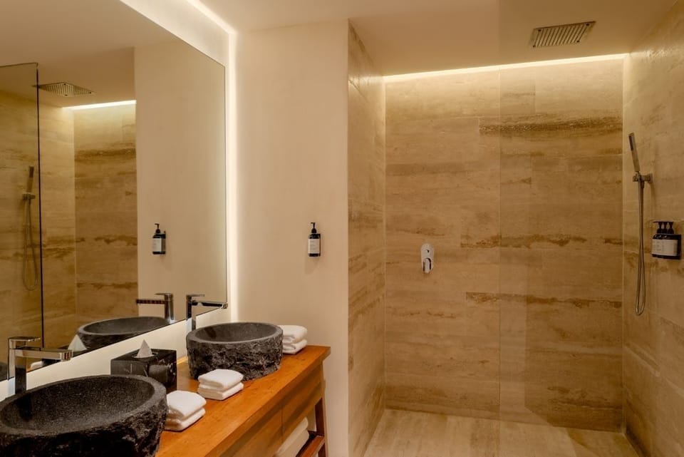 Indulge in a serene, hotel-style shower with premium amenities.
