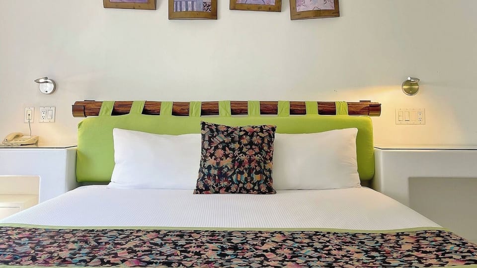 Relax into fresh pillows and a serene, minimalist sleeping space.