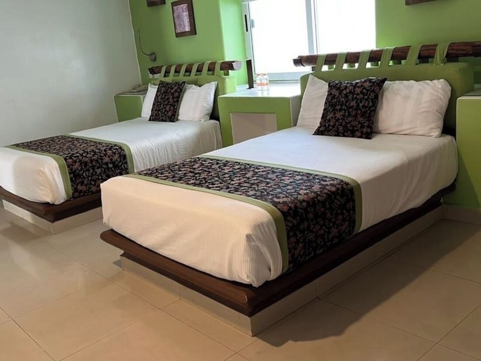 Settle in together with plenty of space between beds.