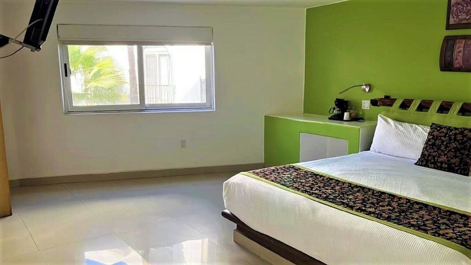 Relax in a clean, open layout with simple comforts.