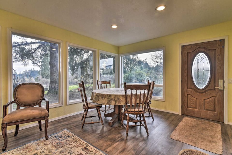 Dining Area | Dining Table | Wraparound Windows & Front Entry