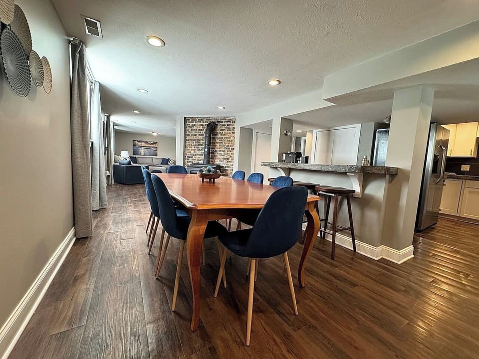The Garden Level has an open concept with the Dining Area connecting to the Living Room and the Kitchen. 
