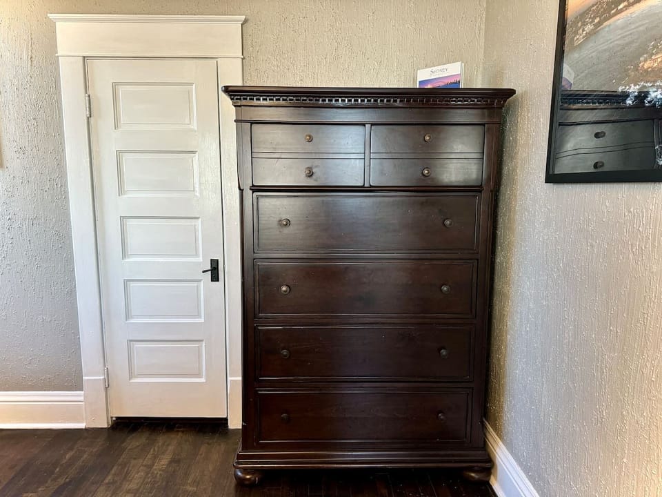 Unpack and stay a while with plenty of storage in the closet and dresser in the Main Level Sydney Room.