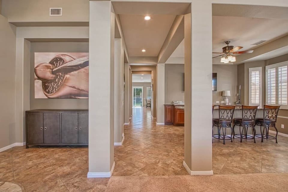 A view from the front of the house looking down the main hallway.