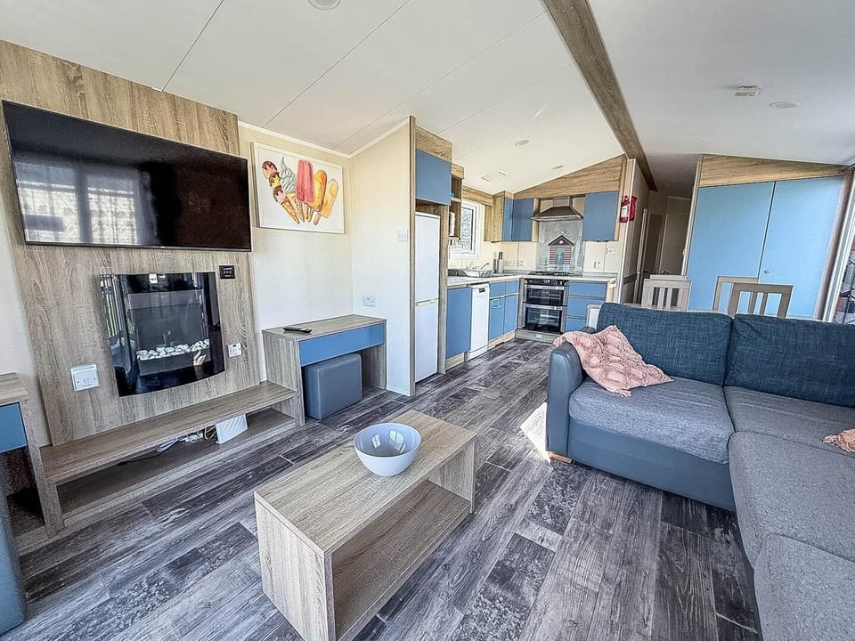 The open plan design of this caravan means you can be in the kitchen but still keep in with the chat.