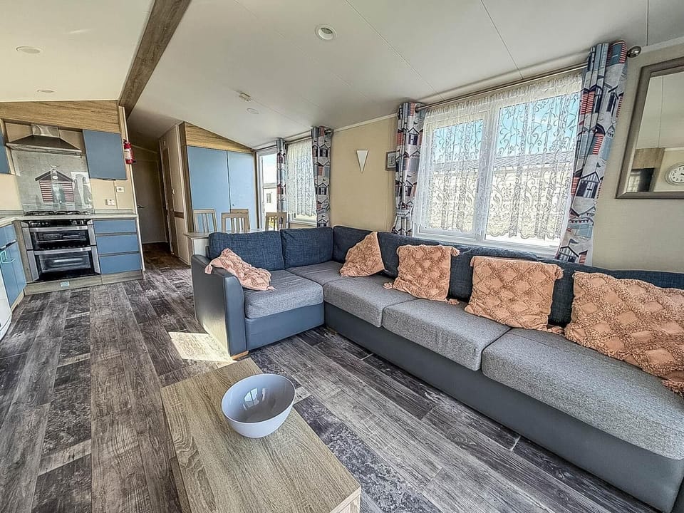 The modern living room is perfect for relaxing and planning your next coastal adventure.