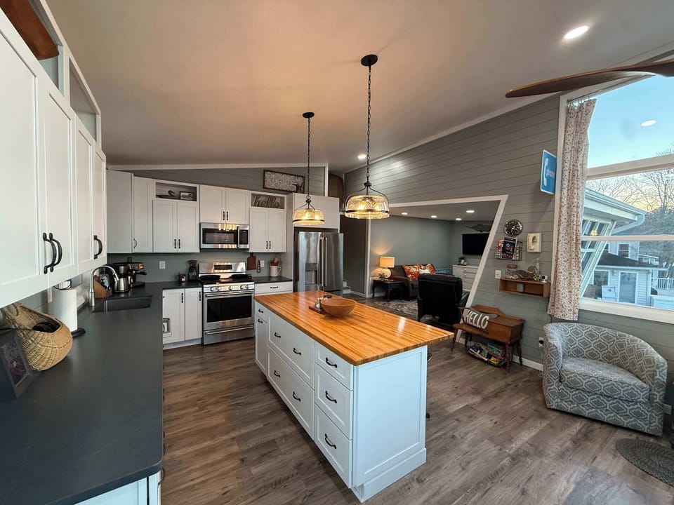 The open kitchen offers ample space & all the comforts of home​