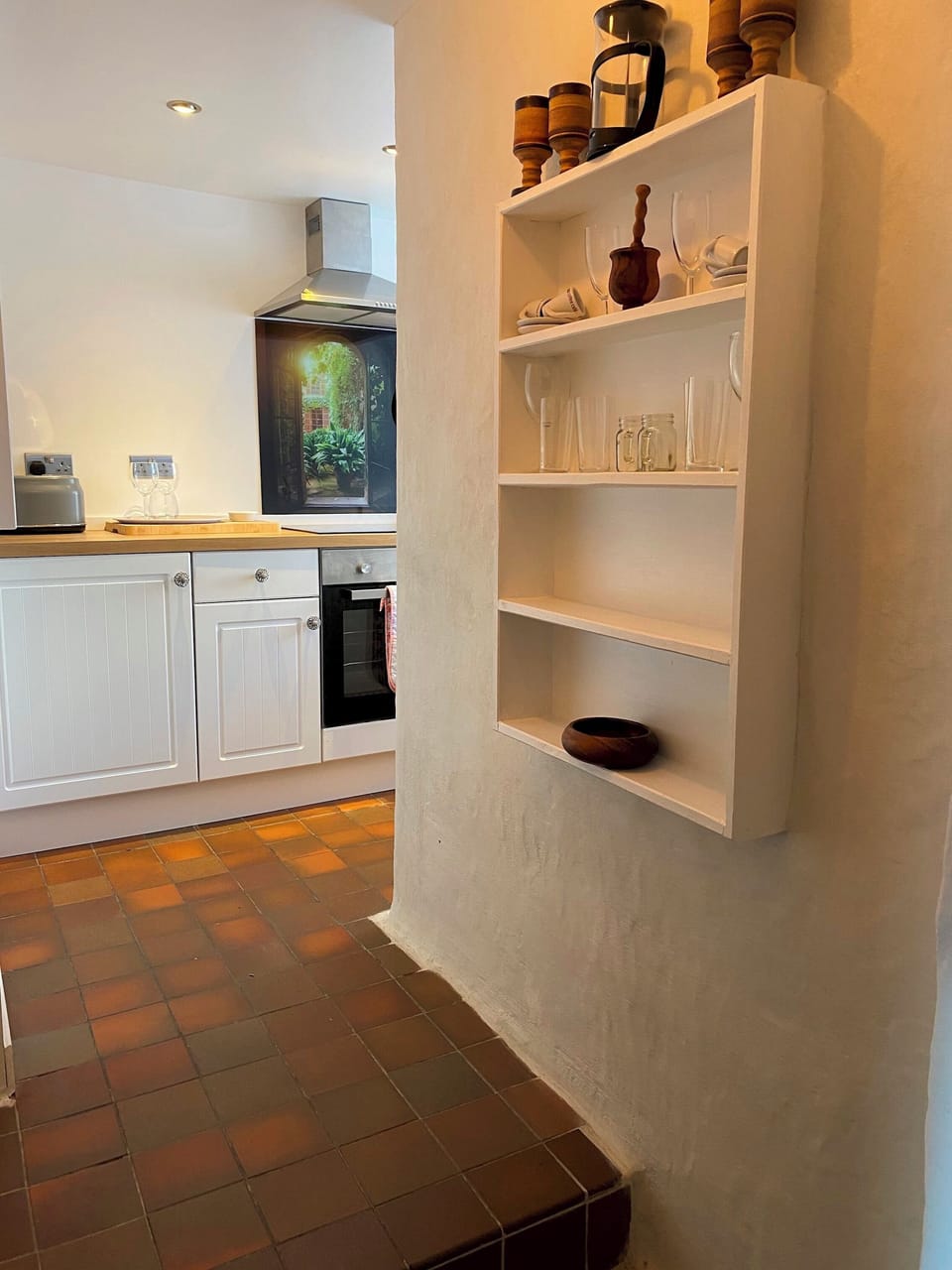 There are three steps to the kitchen