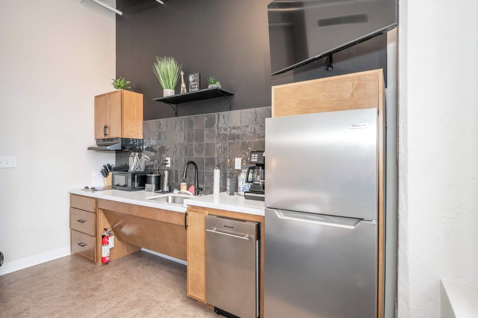 Suite 204’s sleek, open kitchen is well equipped for an unforgettable getaway​