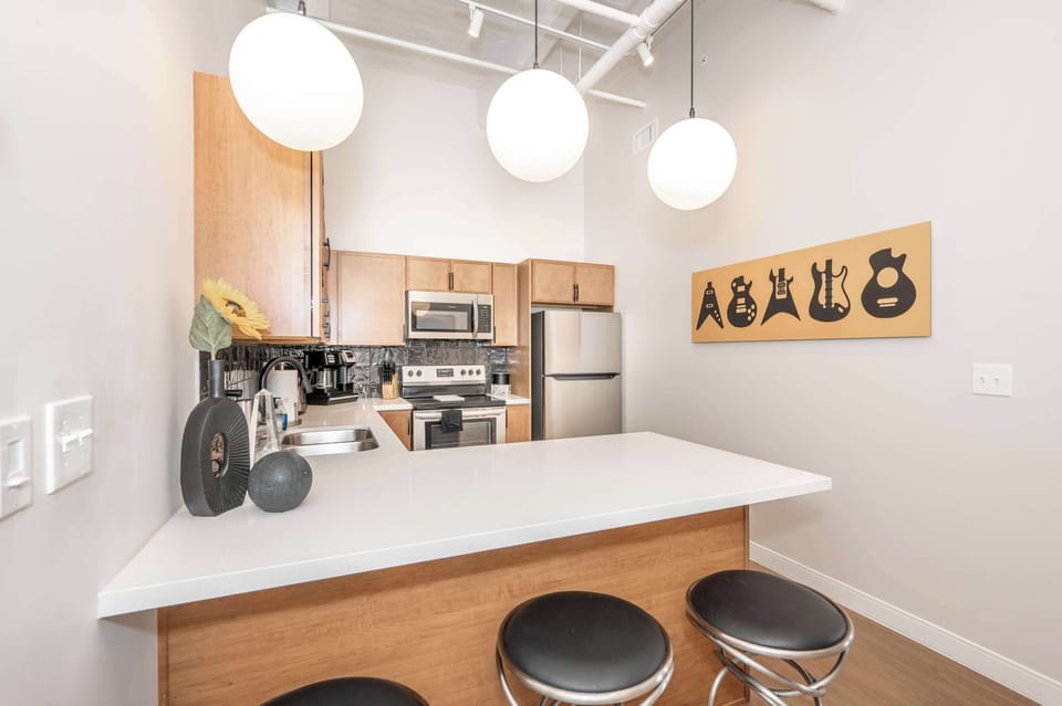 Suite 303’s inviting kitchen offers ample space & all the comforts of home​
