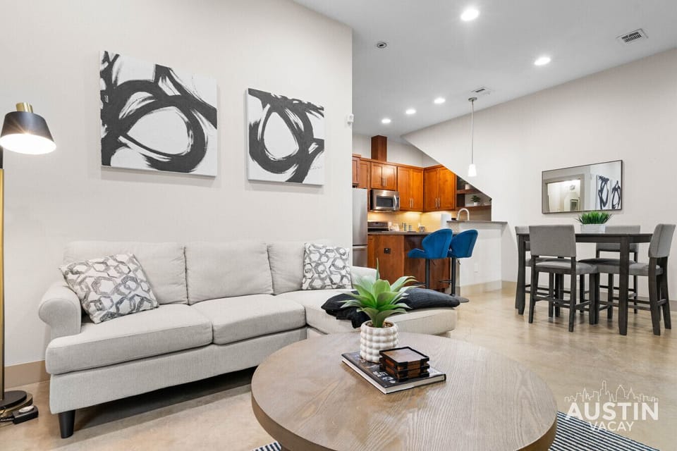 Gather on the sectional while dinner simmers just steps away