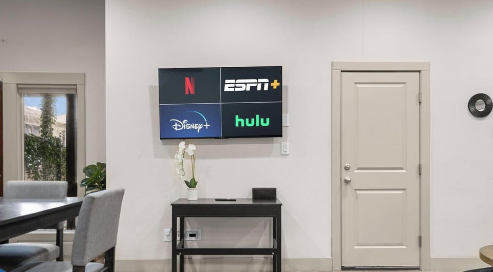 Stream your favorites on the wall-mounted smart TV