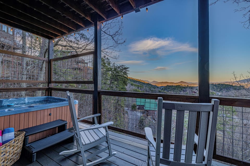 Golden hour views from the lower‑level hot tub deck