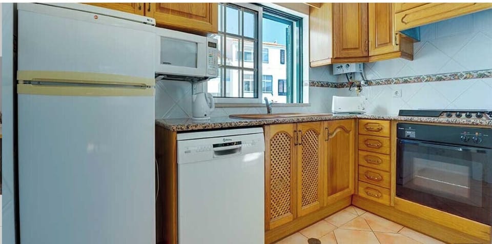 Cook comfortably with full-size appliances and generous counter space.