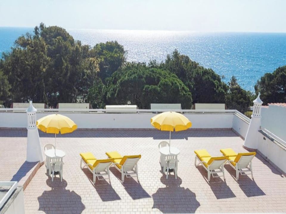 Unwind on the sun terrace with sweeping ocean views.