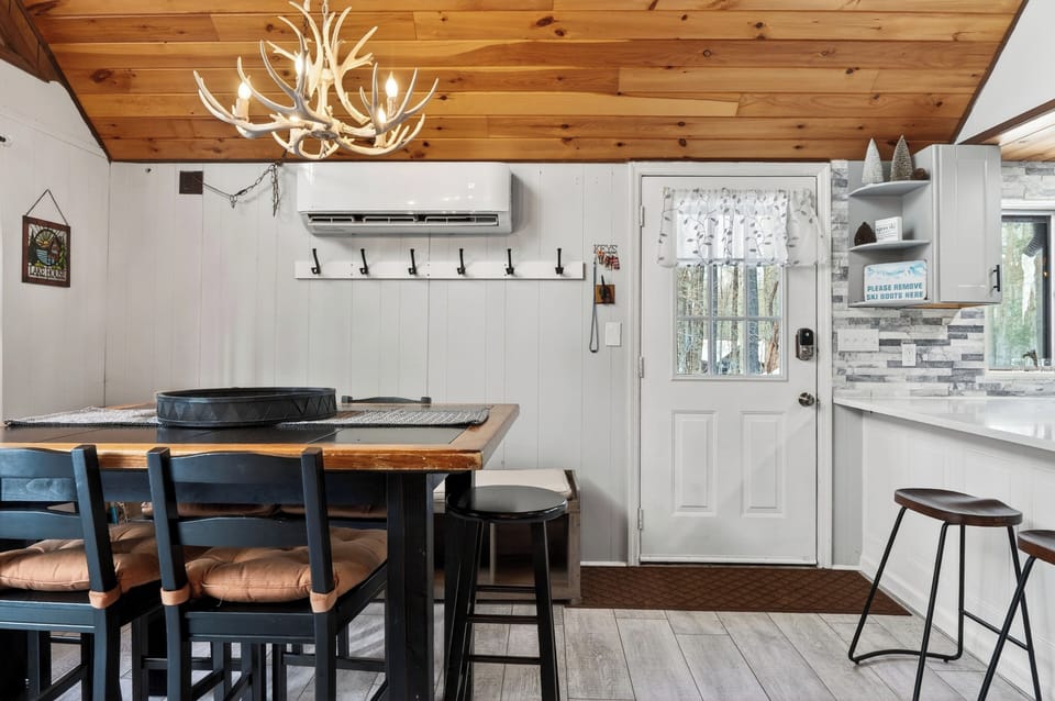 Dining featuring a wood table perfect for family meals.