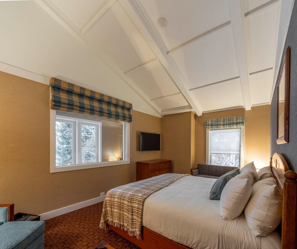 Unwind in plush bedding after a day of exploring.