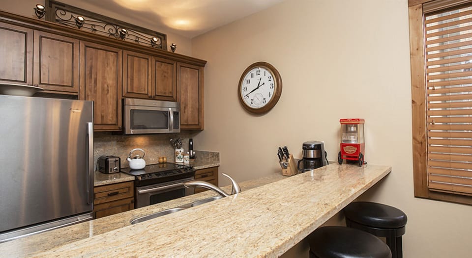 Cook with ease on granite counters and stainless appliances.