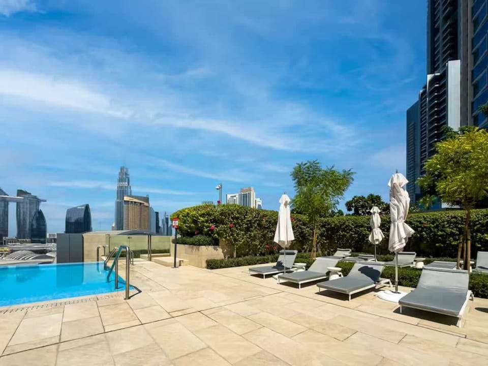 A swimming pool experience elevated with panoramic views of Dubai’s world-famous skyline.