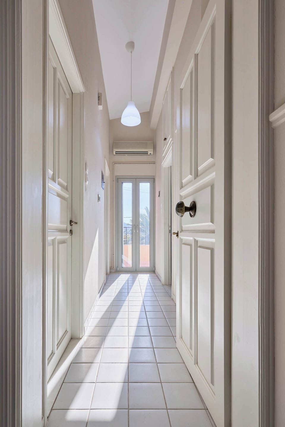 Bright hallway connecting all rooms with ease