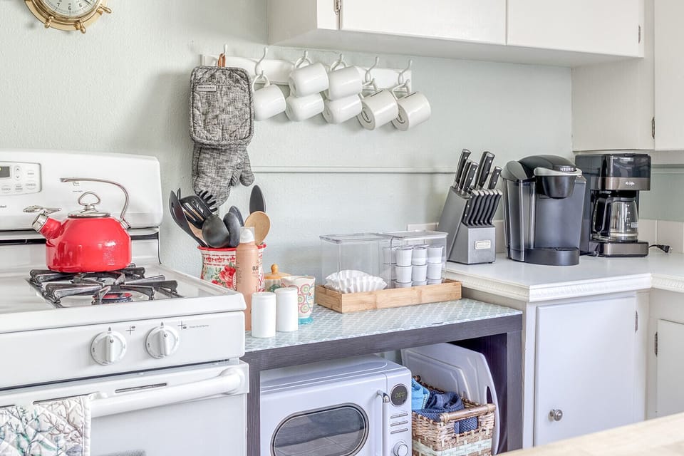 Your fully equipped kitchen awaits with everything you need to brew morning coffee or cook family meals together.