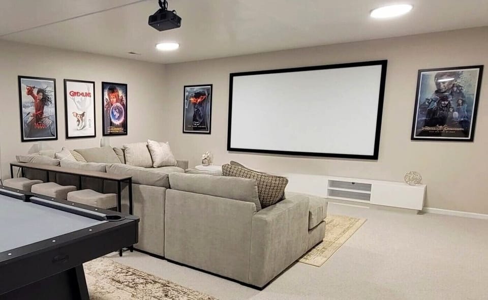 109" home theater screen with oversized sectional for extra sleeping arrangement