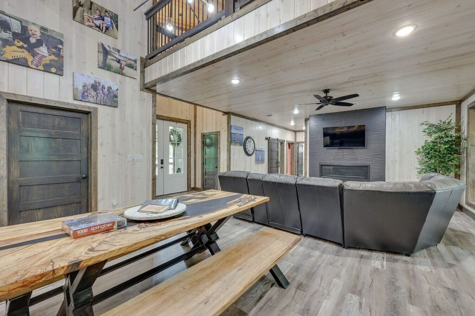 Living Room | Wall-Mounted TV | Loft Balcony Overlook