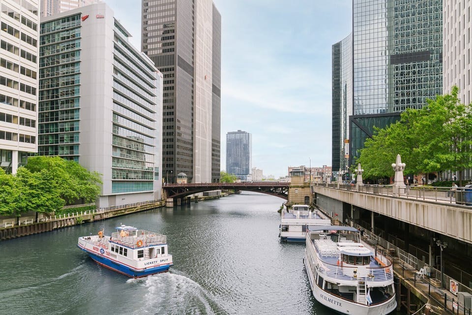 Scenic Chicago River views with architecture boat tours and riverwalk dining nearby.