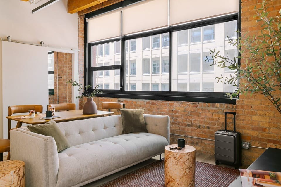 Bright living space with natural light and city views