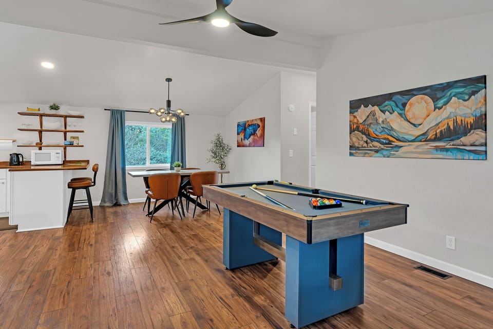 Challenge friends to pool while you unwind in this bright, open space complete with dining area and kitchen.