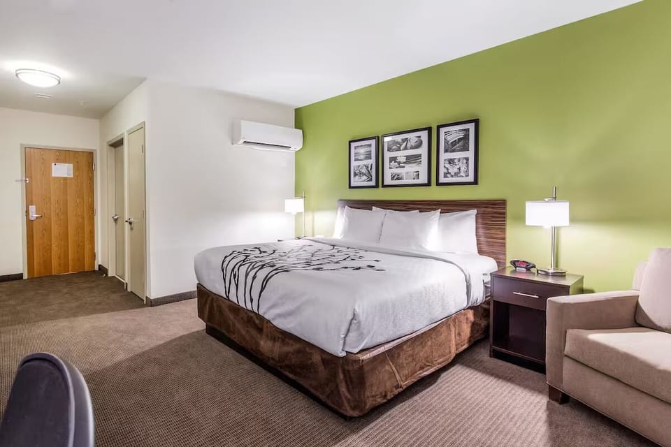 Drift off comfortably in a calm room with bedside lighting.