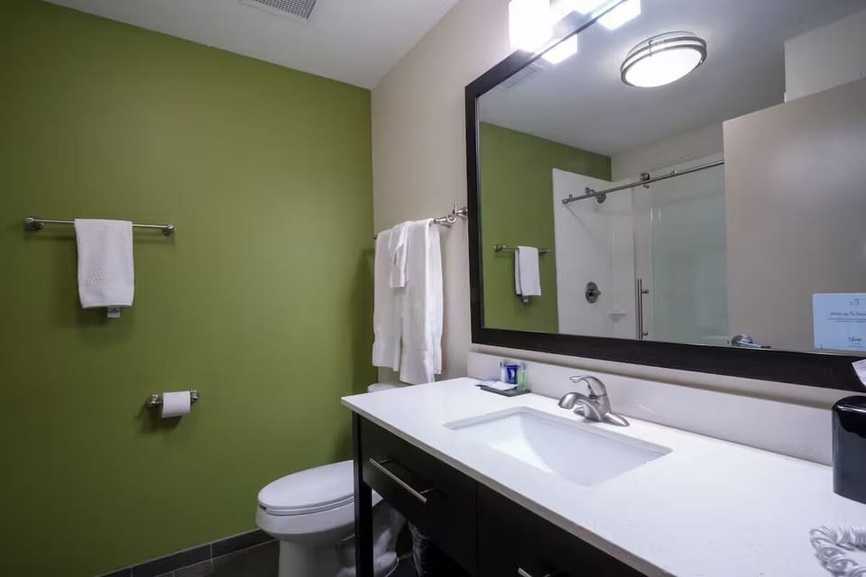 Refresh in a bright vanity area with generous counter space.