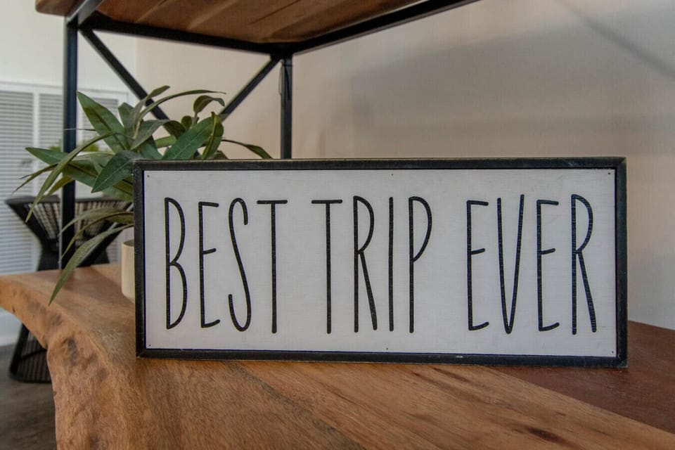 Welcoming `Best Trip Ever` wooden sign
