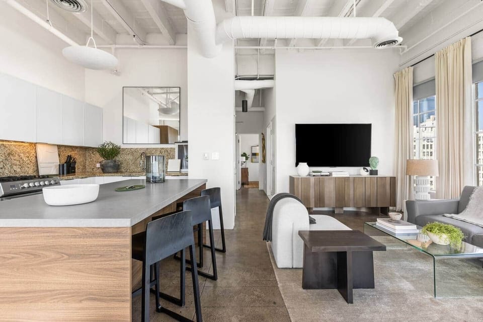 Contemporary design with a cozy dining nook and stylish living area for meals and relaxation.