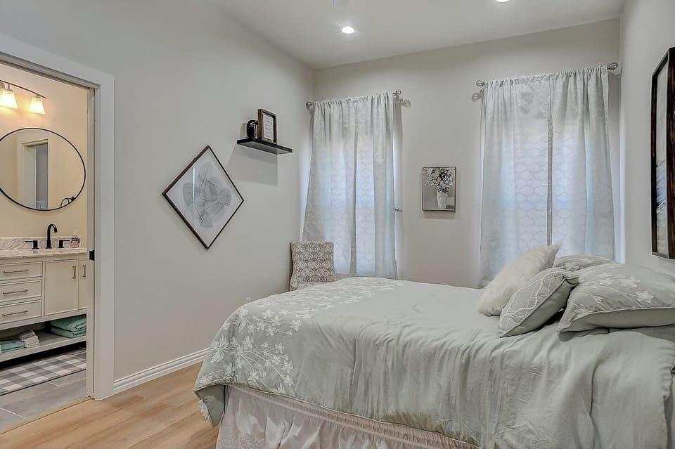 Master bedroom with queen bed and attached full bathroom!