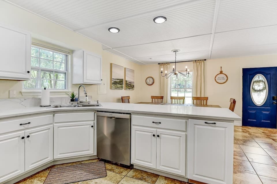 Kitchen view overlooking the trail to fishing cove and dining 