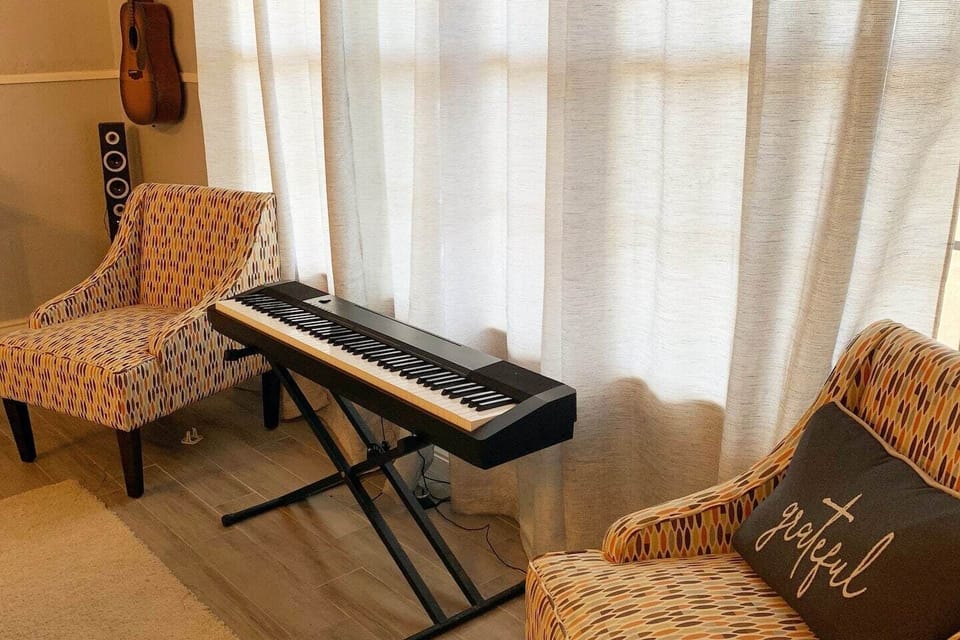 Relax, sit back and enjoy the music in our game room.