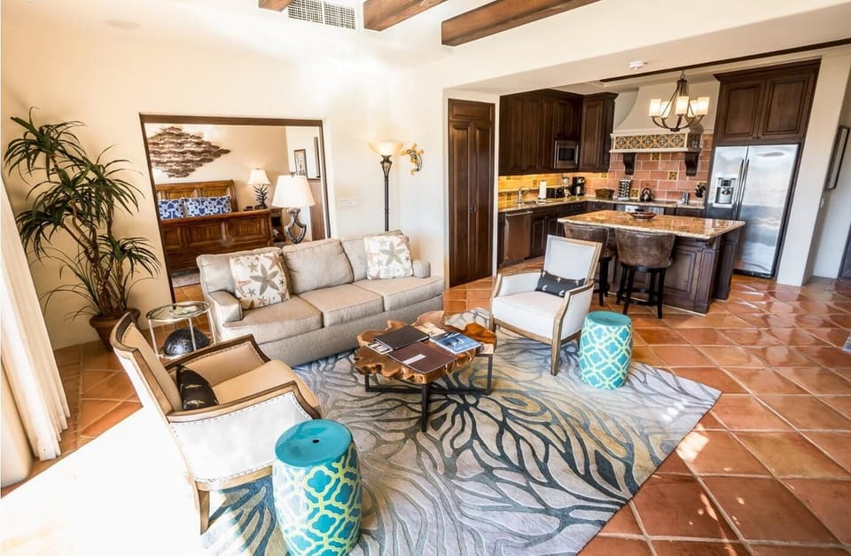 Gather for cocktails in the airy open-plan living space.