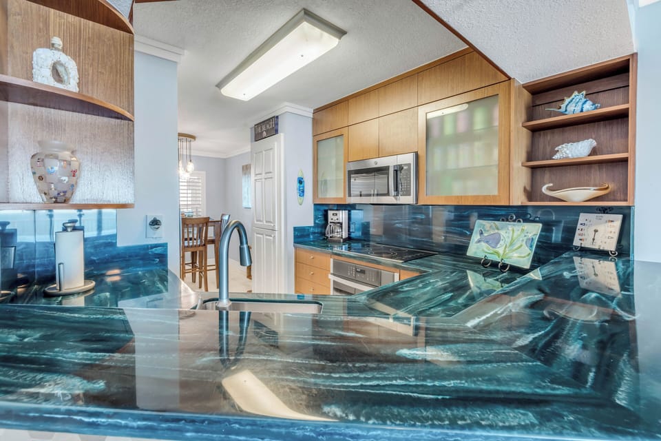Enjoy cooking in this stylish, fully equipped kitchen offering modern finishes and everything you need for easy meals during your stay