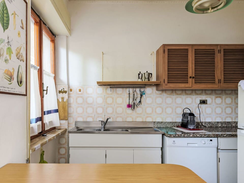 Kitchen, Interior Design, Wood, Flooring, Countertop, Kitchen Appliance, Floor, Major Appliance, Room, Cabinetry