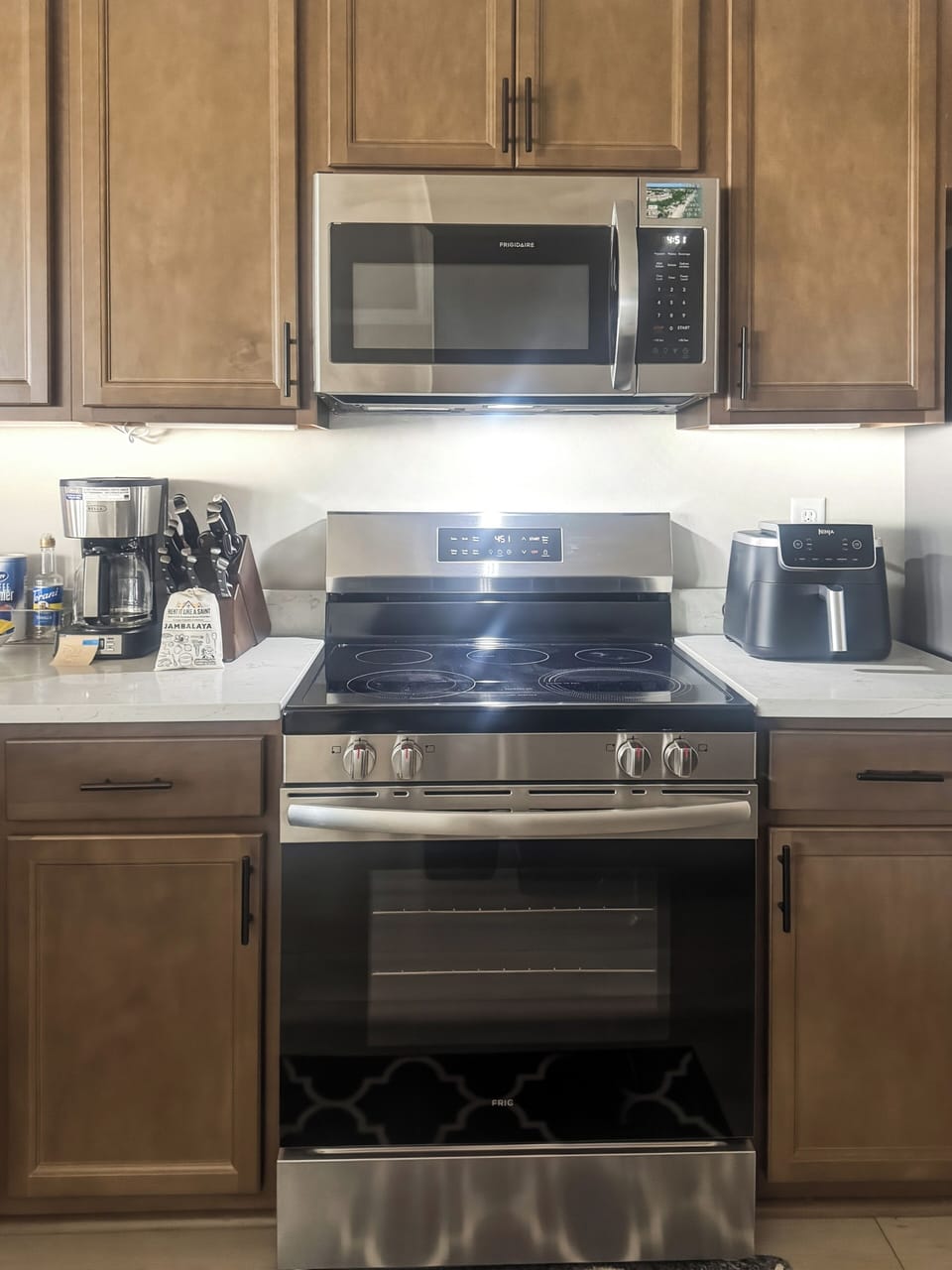 Fully equipped kitchen with modern appliances—cook, prep, and fuel up with ease.
