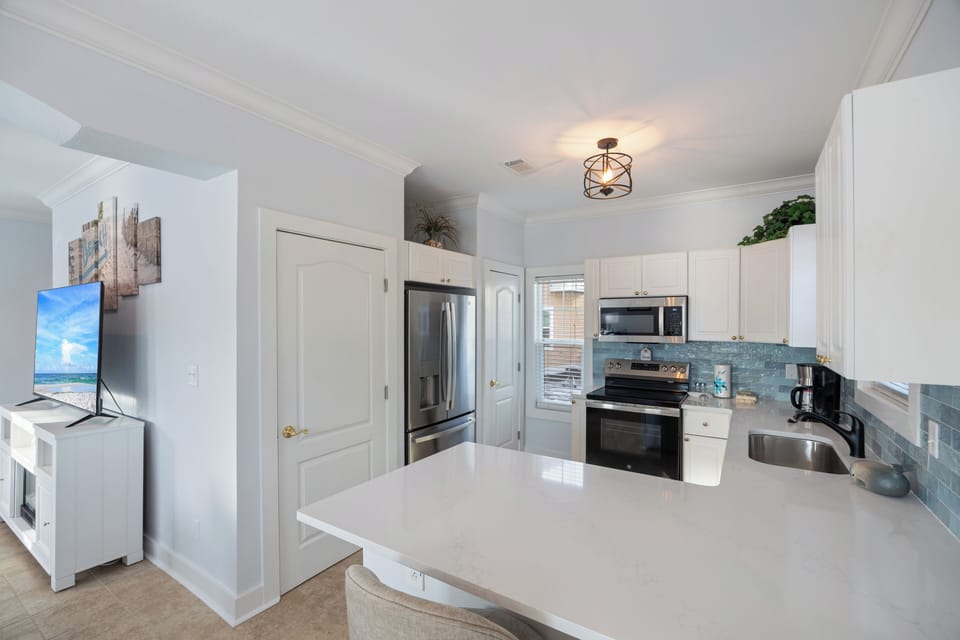 Sandy Toes Bungalow Unit 1A at Purple Parrot by PKRM