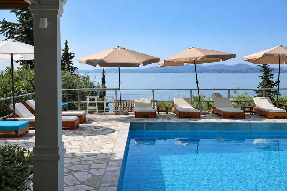 
Relax by the pool while enjoying stunning views of the Barbati coastline and surrounding mountains.