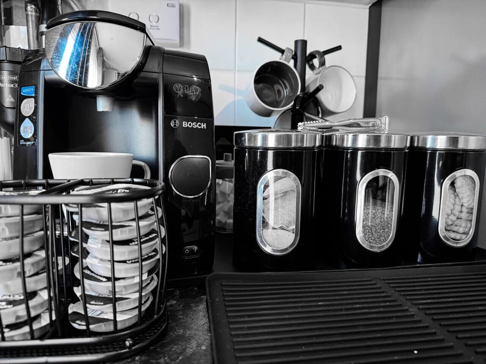 Premium coffee station with Bosch machine for fresh morning coffee.
