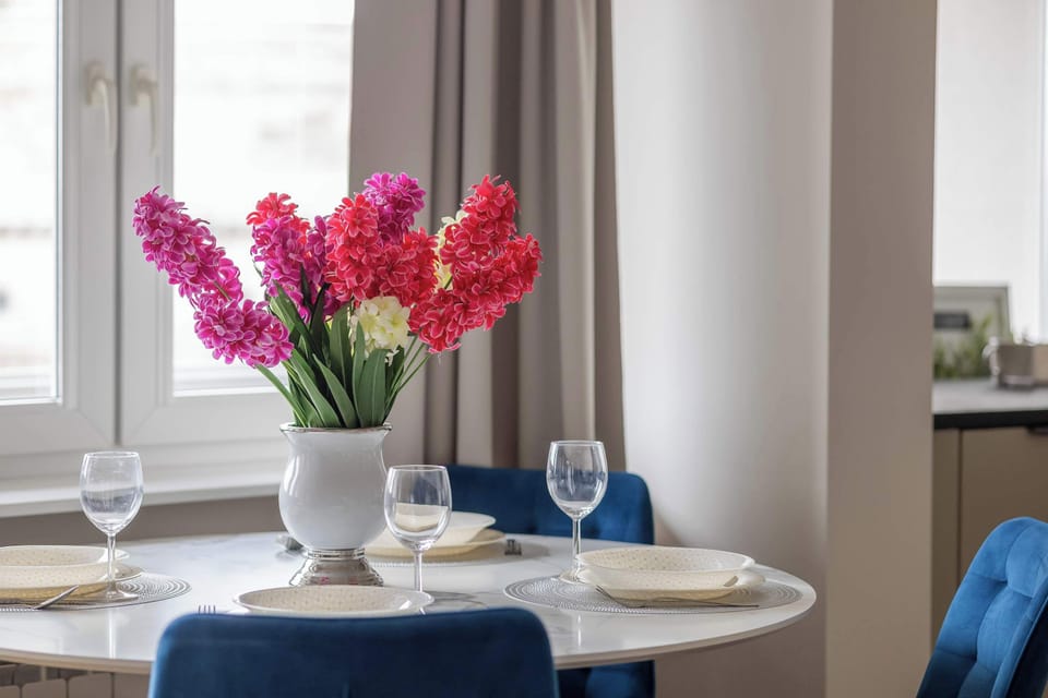 Enjoy your favorite shows on the flat-screen television in the elegant living area.