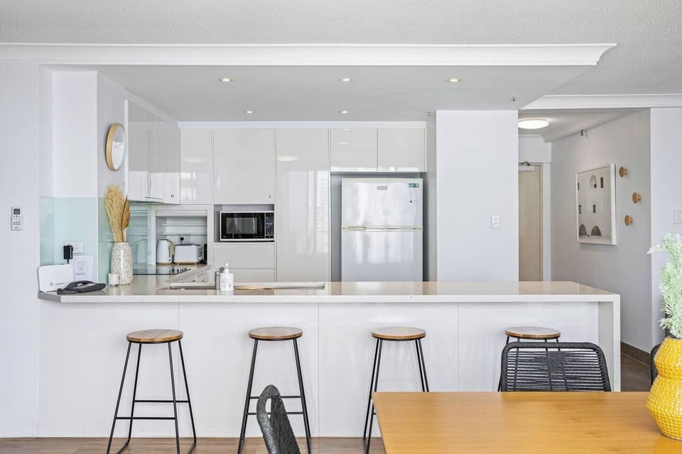 The kitchen offers ample seating at the breakfast bar and is fully-equipped with everything you'll need to cook meals at home.